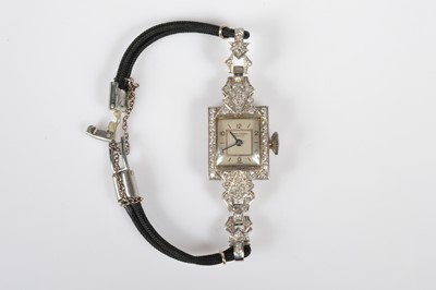 Lot 177 - A Pamm Freres Art Deco manual wind diamond set cocktail dress wristwatch