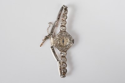 Lot 179 - An Art Deco manual wind 18ct white gold diamond set cocktail dress wristwatch