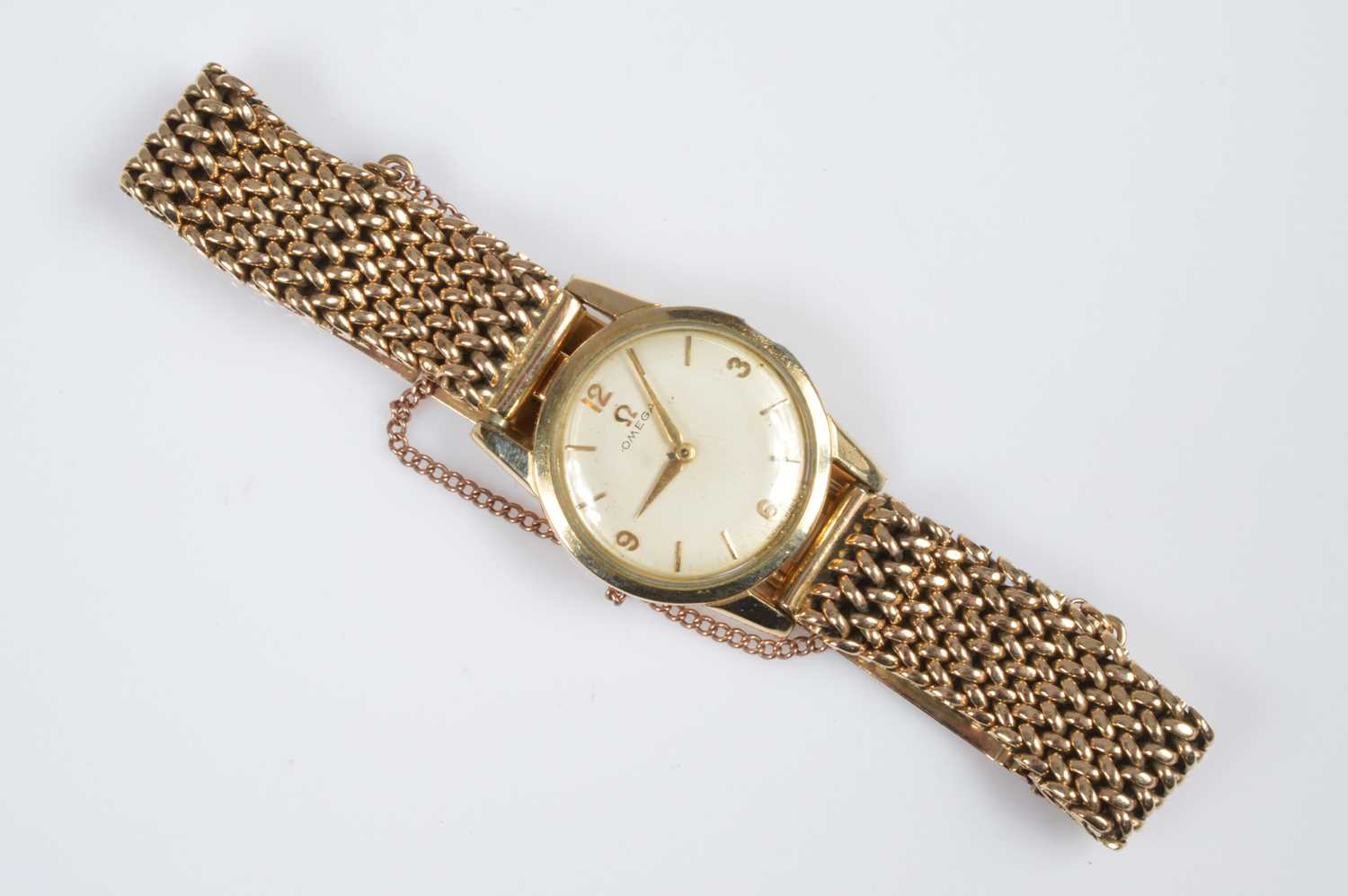 Lot 189 - A c1960s Omega gold plated lady's wristwatch head presented on a 9ct gold bracelet