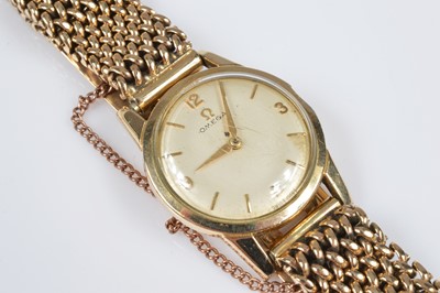 Lot 189 - A c1960s Omega gold plated lady's wristwatch head presented on a 9ct gold bracelet