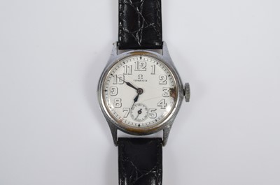 Lot 190 - An early Omega mid sized, chromed manual wind wristwatch head