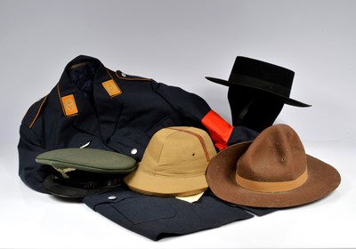 Lot 58 - A German uniform and assorted hats