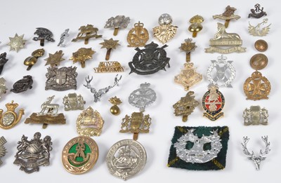 Lot 141 - An assortment of Regimental Cap Badges