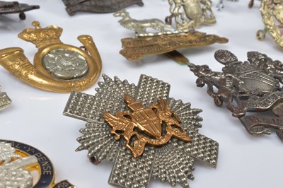 Lot 141 - An assortment of Regimental Cap Badges