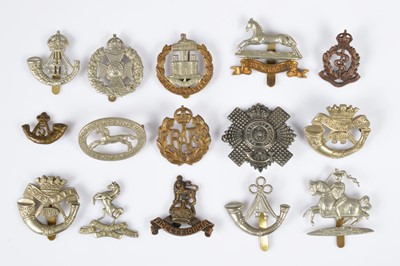Lot 151 - A group of cap badges