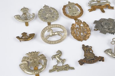 Lot 151 - A group of cap badges