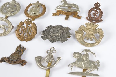 Lot 151 - A group of cap badges