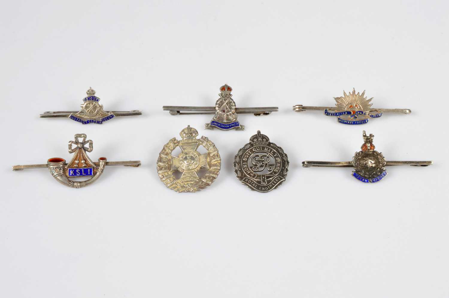 Lot 155 - A group of seven Sterling Silver and enamel Regimental Sweetheart brooches