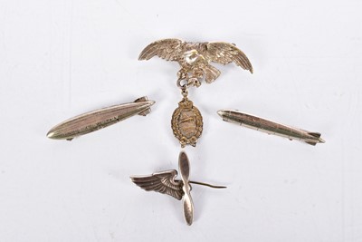 Lot 159 - Two silver Airship badges