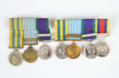 Lot 244 - Two miniature Meal groups