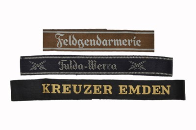 Lot 299 - A group of three German Cuff Bands and Tallies