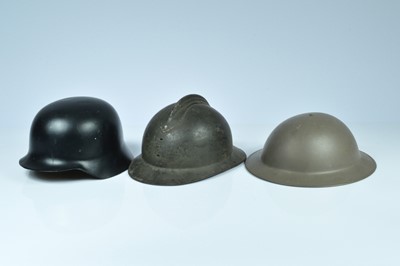 Lot 356 - Three European military helmets