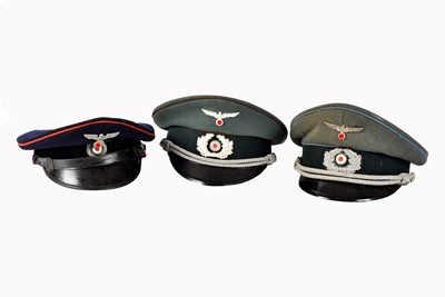 Lot 401 - A group of three Army/Heer Officer's Visor Caps