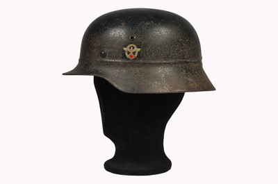 Lot 406 - A WWII Third Reich Police Double Decal Beaded Steel Helmet