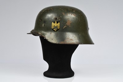 Lot 411 - A WWII German M35 Army Double Decal Steel Helmet