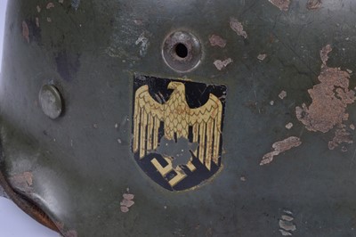 Lot 411 - A WWII German M35 Army Double Decal Steel Helmet