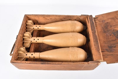 Lot 446 - A WWII German 8cm Mortar Ammunition Case containing three inert Mortars