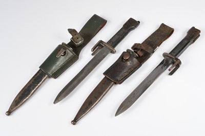 Lot 509 - Two Argentinian FN Type A bayonets and scabbards