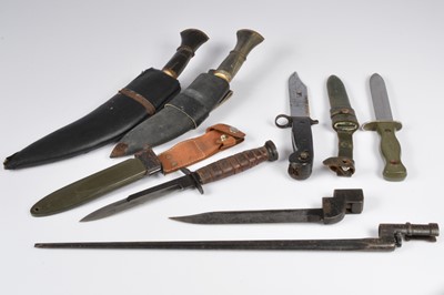Lot 511 - An assortment of various bayonets and knives