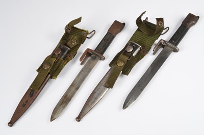 Lot 512 - Two Argentinian FN Type A bayonets and scabbards