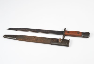 Lot 526 - A WWII Indian Lee Enfield bayonet and Scabbard dated 1942