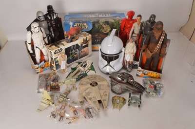 Lot 513 - Large collection of modern boxed and unboxed Star Wars Figures and Space Craft by various makers (32)
