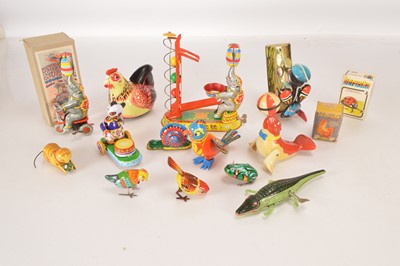 Lot 525 - Various modern Animals Birds and Circus clockwork Tin Toys by various makers and battery operated Hen and plastic Seal and Tudor Rose Hen (15)