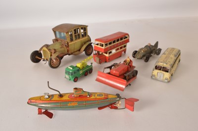 Lot 534 - Various condition  mostly playworn tin and other metals toy Vehicles and tinplate Submarine (7)