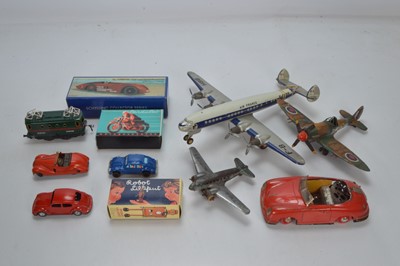 Lot 540 - Modern and vintage boxed and unboxed Tinplate Aircraft Cars Train Robot and Motorcycle by various makers (11)