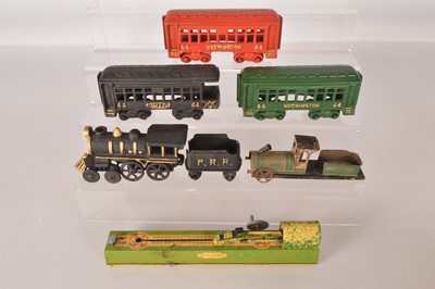 Lot 543 - British made unknown maker tinplate Shunting train and truck and large 'Penny Toy' tinplate Locomotive and modern Cast iron Train (7)