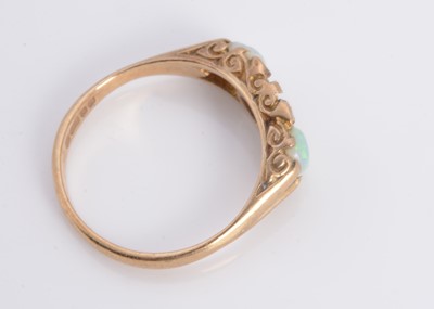 Lot 7 - A 9ct gold bracelet, An 9ct gold 3 stone opal dress ring