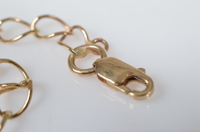 Lot 7 - A 9ct gold bracelet, An 9ct gold 3 stone opal dress ring