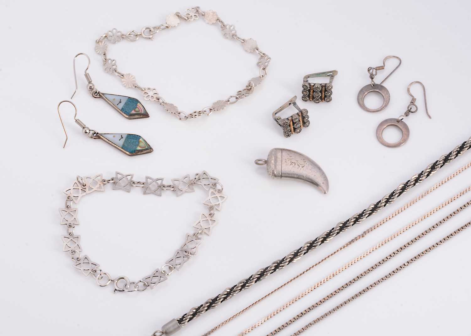 Lot 14 - A collection of white metal items