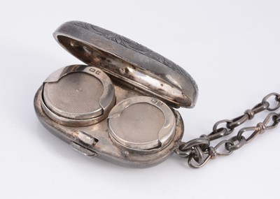 Lot 22 - A silver sovereign case on chain