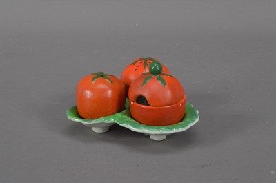 Lot 372 - An early 20th century ceramic Carlton Ware novelty three-piece cruet set