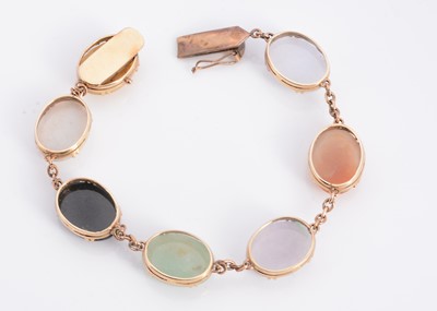 Lot 40 - A yellow metal seven hard stone bracelet