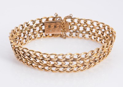 Lot 41 - A 18ct gold three strand curb bracelet