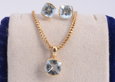 Lot 60 - A 18ct gold aquamarine cushion shaped pendant necklace & matching aquamarine stud earrings