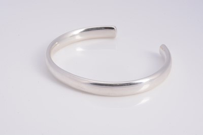 Lot 61 - A modern silver torque bangle