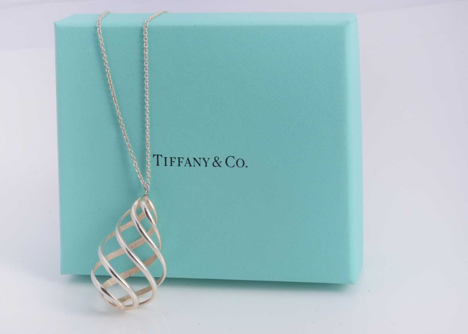 Lot 63 - A silver Tiffany & Co spiral pendant necklace, in turquoise box marked Tiffany & Co