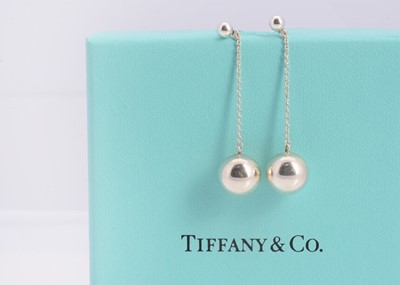 Lot 65 - A pair of silver Tiffany & Co stud, chain & ball drop earrings, in turquoise box marked Tiffany & Co