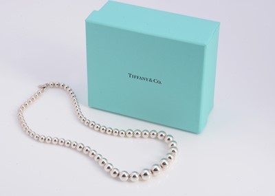 Lot 67 - A silver Tiffany & Co graduated ball necklace, in turquoise box marked Tiffany & Co