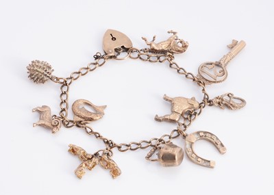 Lot 69 - A 9ct gold charm bracelet