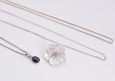 Lot 71 - A synthetic star sapphire silver pendant necklace, mother of pearl flower brooch with pendant bail