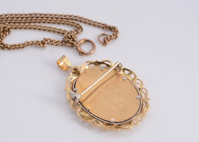 Lot 73 - A 18 ct gold portrait pendant brooch with 14 ct gold chain