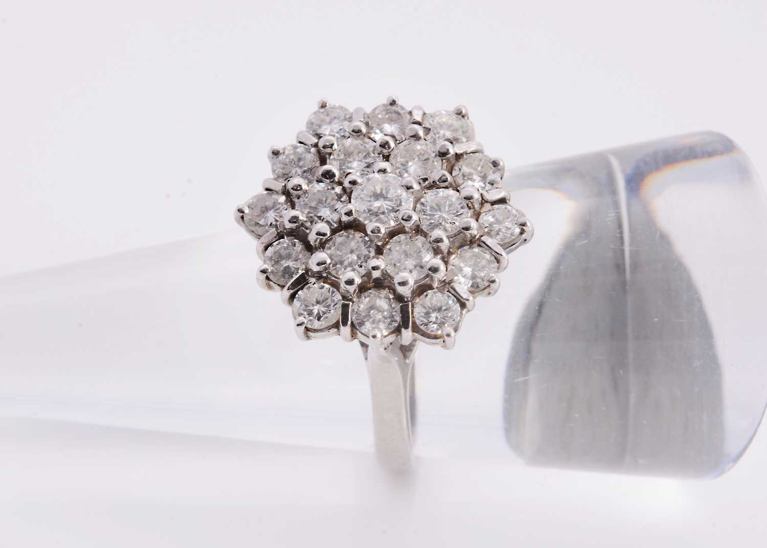 Lot 74 - A 18ct white gold diamond cluster ring