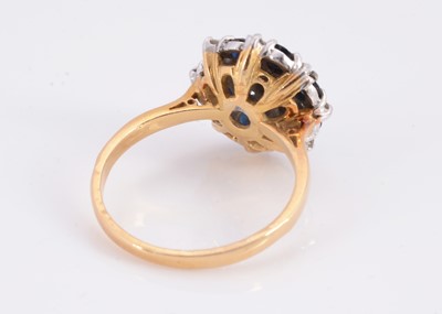 Lot 75 - A 18ct sapphire & diamond cluster ring