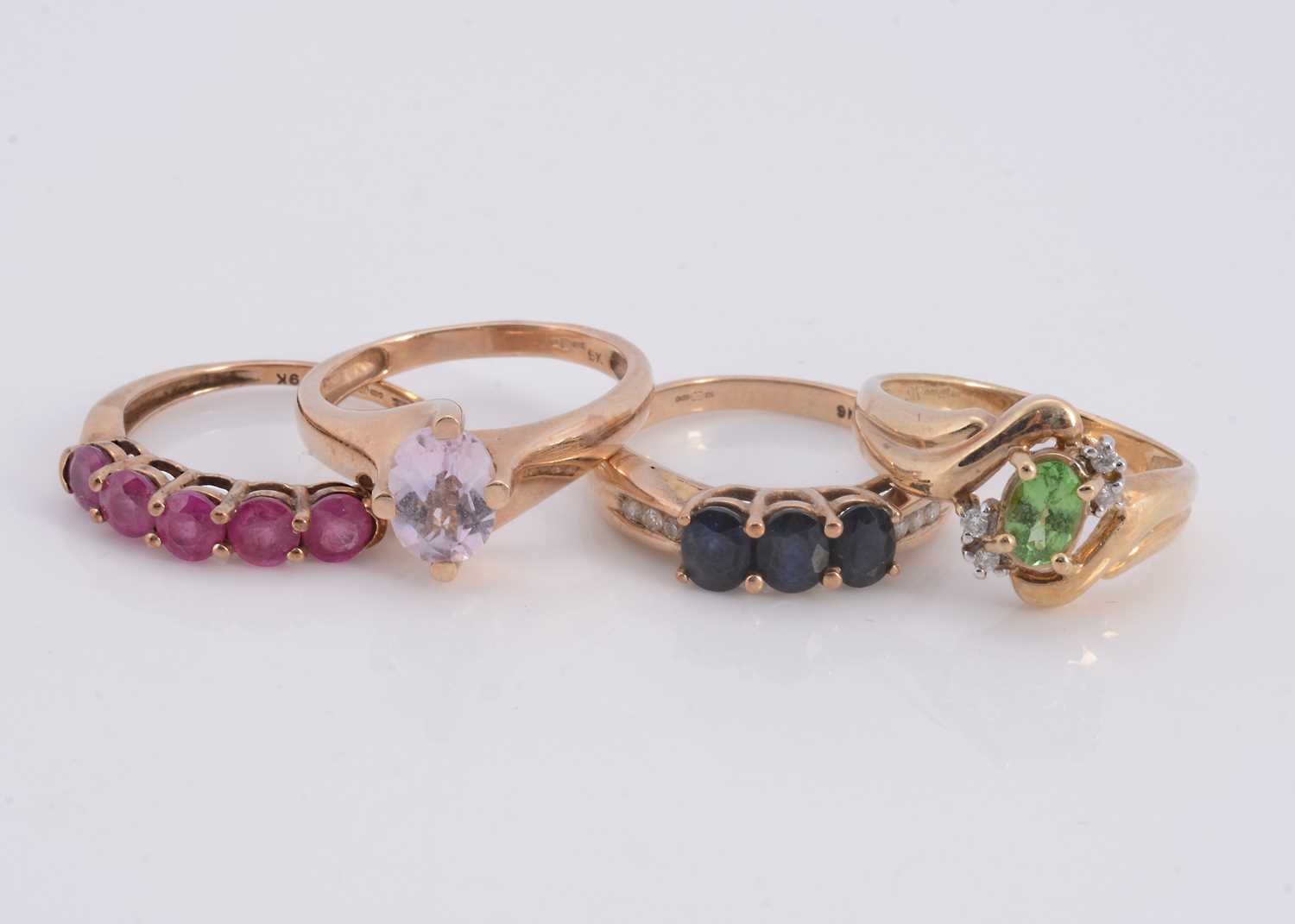 Lot 81 - Four 9ct gold gem set rings