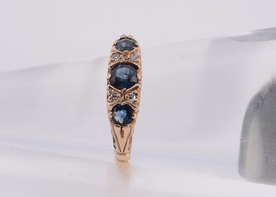 Lot 83 - A 9ct gold sapphire & diamond dress ring