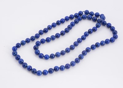 Lot 86 - A Lapis bead necklace